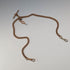 Antique British rolled gold double Albert chain with brass key fob